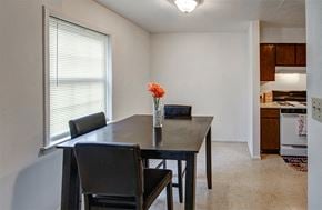 Indianapolis apartment for rent - Dining Room big enough for a four-piece dining set at Carriage House East