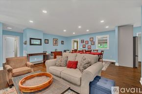 Murfreesboro house for rent - A kitchen with a white fridge and a white oven.