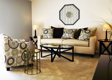 Mishawaka apartment for rent - a living room with a couch and a table