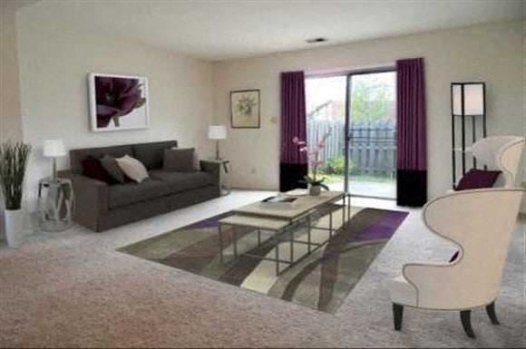 Toledo apartment for rent - a living room with a couch and a table