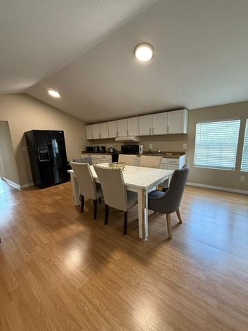 Lakeland apartment for rent - A kitchen with a table and chairs in the middle of the room.