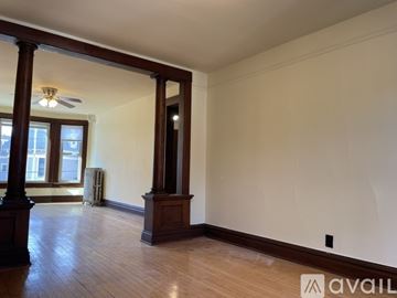 Madison apartment for rent - A living room with a grey couch and a wooden coffee table.