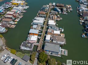 Sausalito house for rent - A bird's eye view of a waterfront area with boats and buildings.