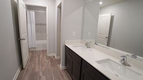 Forney house for rent - A bathroom with a white counter top and a white sink.
