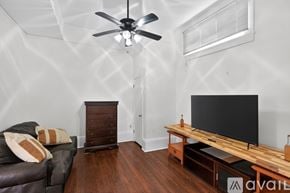 New Orleans apartment for rent - A dining room with a table and chairs.