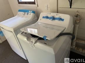Placerville apartment for rent - A white washing machine and dryer are taped together.