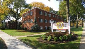 Parma apartment for rent - A red brick building with a sign that says Westview Heights.