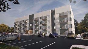Dryden apartment for rent - A modern apartment building with cars parked in front.