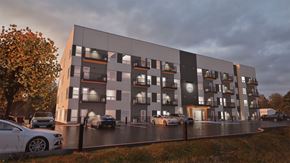 Dryden apartment for rent - A modern apartment building with cars parked in front.