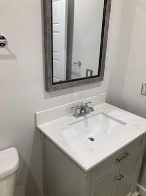 Halifax apartment for rent - A bathroom with a sink, mirror and toilet.