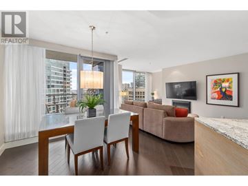 Vancouver apartment for rent - A modern living room with a dining table and chairs.