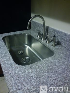Tampa apartment for rent - A room with a door and a wall socket.