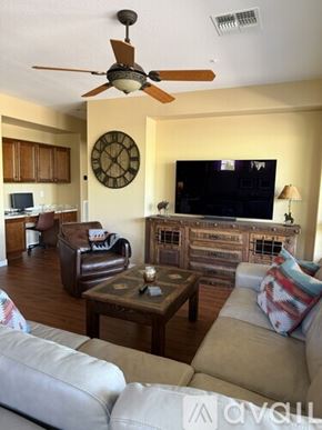 Peoria house for rent - A brick pathway leads through a landscaped garden.