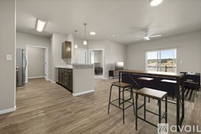 Summerset apartment for rent - A modern kitchen with a dining table and chairs.