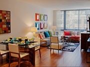 Washington apartment for rent - A dining room with a glass table and chairs.