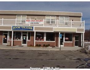 Groton apartment for rent - A bookstore with a sign that says Book Trader.