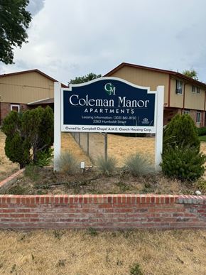 Denver apartment for rent - A sign for Coleman Manor Apartments is displayed in front of a building.