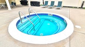 Whitehall apartment for rent - A round hot tub with a blue interior and a white exterior.