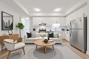 Kitchener apartment for rent - A modern kitchen with a dining table and chairs.