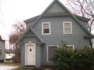 Pullman apartment for rent - A small house with a white door and two windows.
