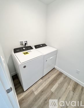 Cedar City townhouse for rent - A small bathroom with a white cabinet and sink.