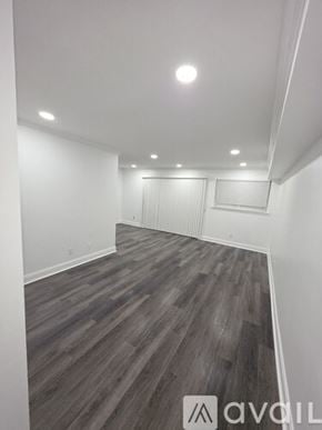 Slidell apartment for rent - The Anchorage is a grey building with a sign on the front.