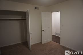 Montgomery house for rent - A room with a white door and a white wall.