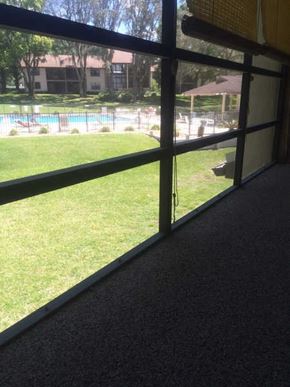 Hernando house for rent - A view of a pool through a window.