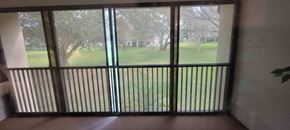 Hernando house for rent - A balcony with a view of a green lawn and trees.