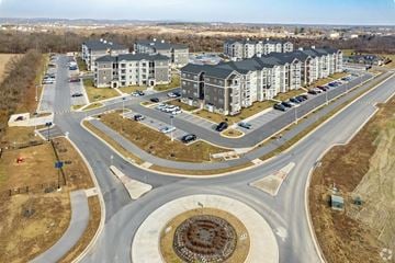 Winchester apartment for rent - A roundabout with a building in the background.