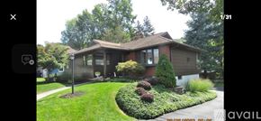 Vestal house for rent - A room with two windows and a door is available for rent.