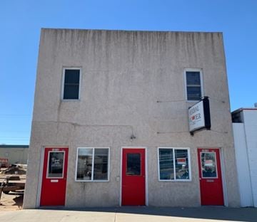 Kearney apartment for rent - A building with a sign that says "SALON" on it.