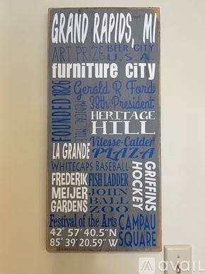 Grand Rapids house for rent - A sign with various words and phrases on it, including "Grand Rapids, MI", "Art Prize", and "Furniture City".