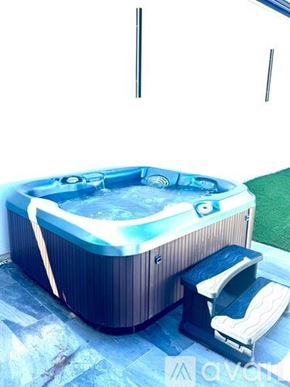 Los Angeles house for rent - A hot tub with a blue light on it.