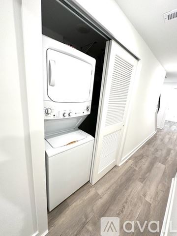 Philadelphia apartment for rent - A white dishwasher is open in a kitchen.