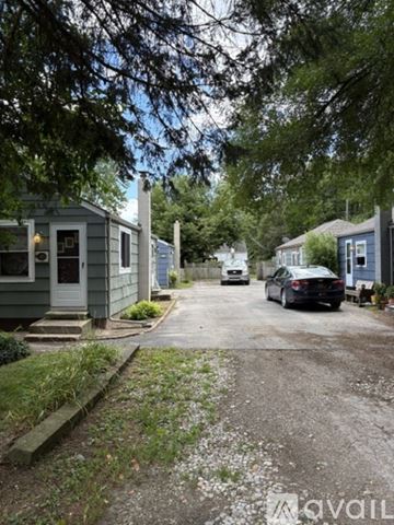 Whitmore Lake house for rent - A living room with a rug and a couch.
