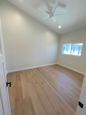 San Diego apartment for rent - A room with a ceiling fan and a window.