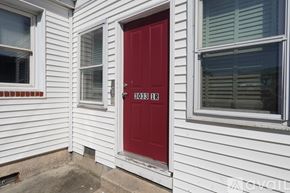 Baltimore apartment for rent - A red door with the number 3038 on it.