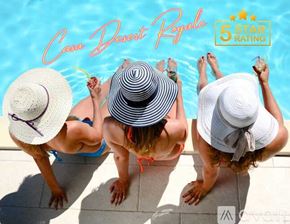 Palm Desert house for rent - Three women wearing hats are sitting by a pool.