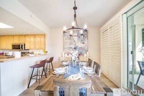 La Quinta house for rent - A dining room with a table set for a meal.