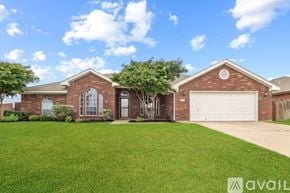 Harker Heights house for rent - A house with a garage and a driveway in front.