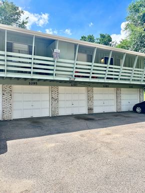 Lakewood apartment for rent - A parking garage with the numbers 1095, 1097, and 1089 visible on the wall.