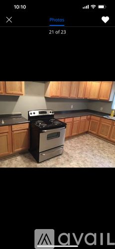 Jackson house for rent - A black stove top oven sitting on a kitchen counter.