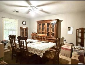 El Campo house for rent - A dining room with a table set for a meal.