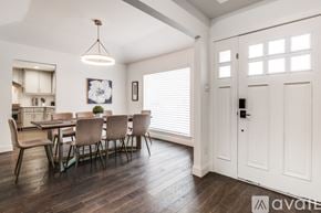Dallas house for rent - A dining room with a table and chairs.