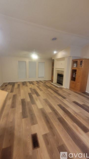 Fort Worth house for rent - A living room with a couch and a coffee table.