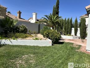 Las Vegas house for rent - A well-maintained garden with a variety of plants and trees.