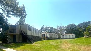 Woodville apartment for rent - A sunny day at the mobile home park with a clear blue sky.