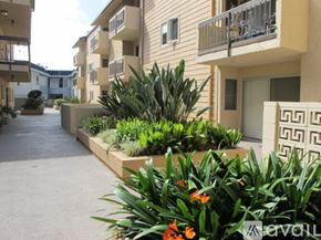 Culver City apartment for rent - A row of apartment buildings with a landscaped garden in front.
