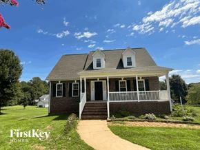 Advance house for rent - A house with a porch and a sign that says "FirstKey Homes".